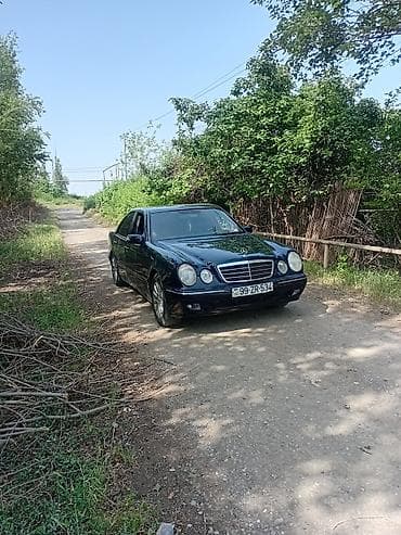 Mercedes-Benz E‑Class W210 sedan - Korpus: 4 qapılı sedan, tünd