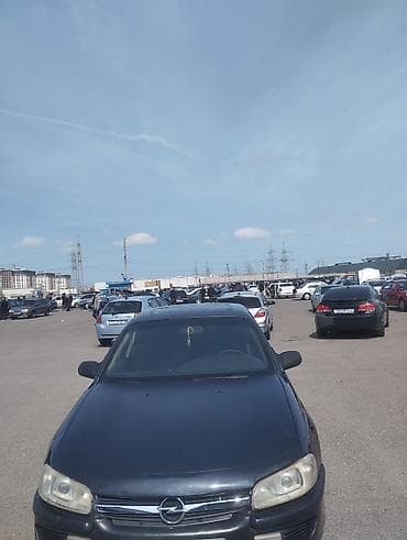 xrom az: Opel Omega B sedan - Kuzov: 4 qapılı sedan, qara rəng - Salon: qara — 4