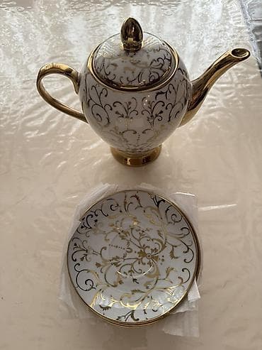 bala pisiklər: Porcelain çay dəsti – zərif qızılı naxışlı Məhsulun tərkibi: - 1 ədəd — 1