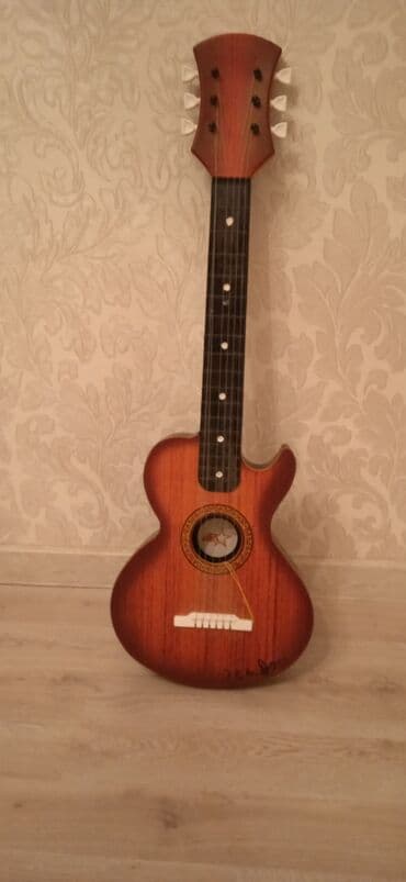 oyuncaq gitara: Oyuncaq qitara 18 AZN yenidir — 2