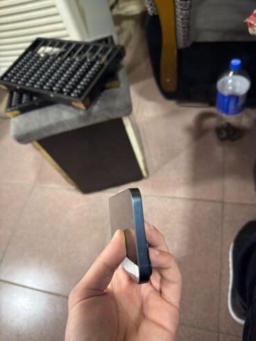 Cadillac: IPhone 14, Mavi, Face ID — 7