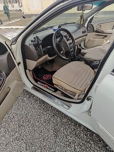maş: Nissan Sunny sedan - Kuzov: ağ rəng, 4 qapı, yüngül lehimli disklər - — 5
