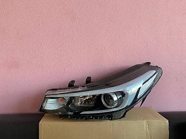 Nəqliyyat: Kia Forte-Cerato 2016 on faralari .Kia Cerato 2016 qabaq sag ( sağ ) — 1