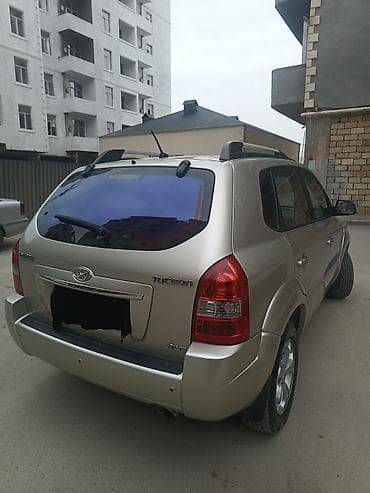 guzgusu: Hyundai Tucson (1-ci nəsil) krossover/SUV - Korpus rəngi: açıq gümüş — 5