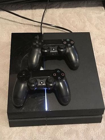 video reqstrator: Sony PlayStation 4 slim. Yaxsi vezyetdedur problemi yoxdur.10 oyun var — 1