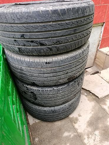 4 ədəd avtomobil şini - Ölçü: 215/55 R16 - Yük/sürət indeksi: 93V -