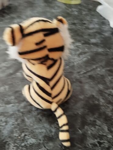 uşaq yelencek: Игрушка музыкальная 
musiqili oyuncaq — 4