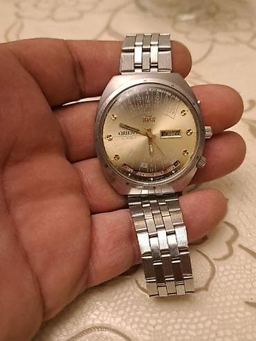 kişi saat arient: Yeni, Qol saatı, Orient, rəng - Qızılı — 2