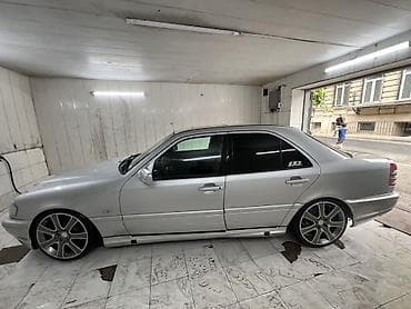 mercedes e class: Mercedes-Benz C-klass (W202) sedan - Kuzov rəngi: gümüşü - Salon — 7