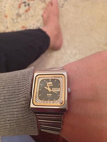 İşlənmiş, Qol saatı, Orient, rəng - Gümüşü — 1