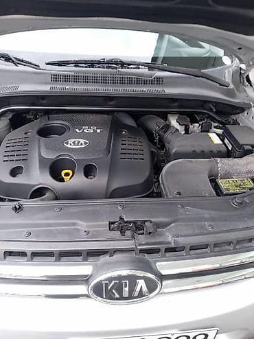 volkswagen tiguan ii: Kia Sportage: 2 л | 2007 г. Универсал — 6