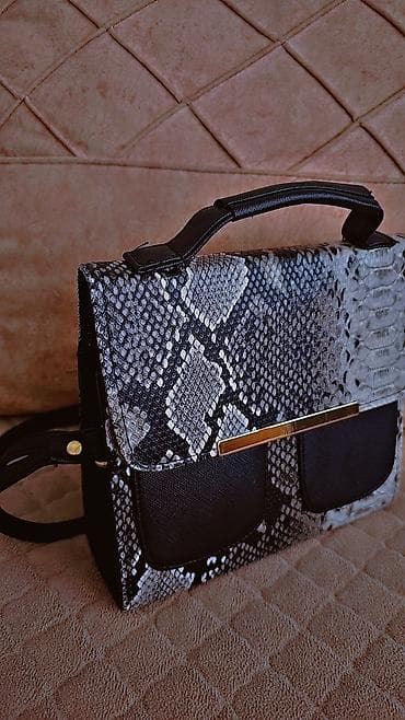 Əl çantası, İşlənmiş