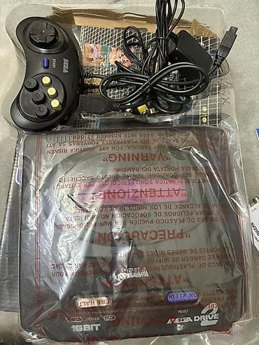 Video oyunlar və konsollar: SEGA Mega Drive II 16-bit video oyun konsolu Tezedi hec istivade — 1