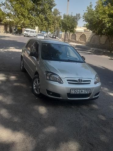 2005 kia sephia: Toyota Corolla: 1.4 l | 2005 il Hetçbek — 1