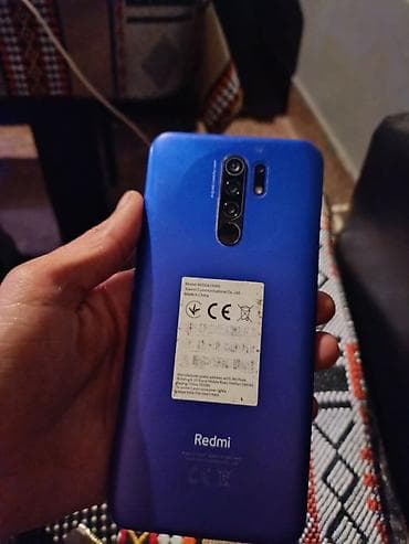 Xiaomi Mi 9, 32 GB, rəng - Göy, 
 Düyməli, Barmaq izi, Face ID
