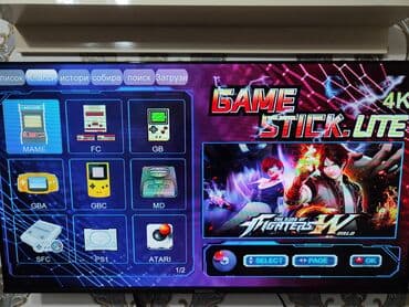 neos televizor: Game Stick Lite 4K – 2.4G simsiz oyun konsolu və gamepad dəsti — 7