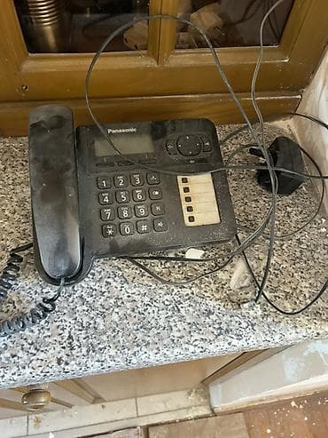 Stasionar telefon Panasonic, Simli