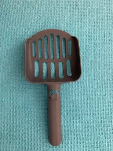 Pişik qumu üçün nəzərdə tutulmuş bu kürək pişik qutularını təmizləmək