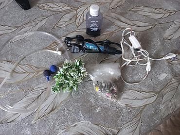 akvaryum aksesuarlari: Akvaryum üçün aksesuarlar dəsti Paketin tərkibi: - Elektrikli su — 1