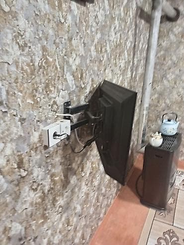 Divar üçün fırlanan TV dayağı + divara quraşdırılmış televizor - lalafo.az -da Divar üçün fırlanan TV dayağı + divara quraşdırılmış televizor -