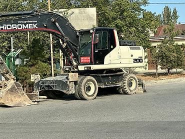 avtomobil icarəyə: Salam Tekerli ekskavator icaresi Ayliq ve günlük — 3