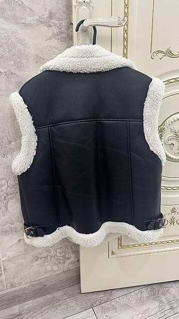 Digər qadın geyimləri: Qalın içlikli, qolsuz süni dəri jilet - Model: ikitərəfli üslubda — 2