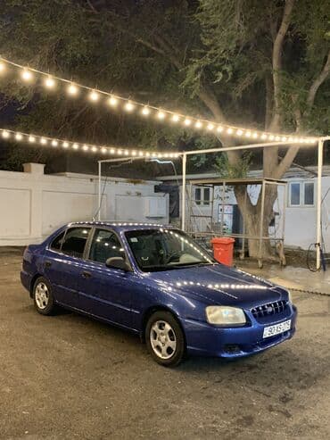 Hyundai Accent: 1.6 l | 2001 il Sedan — 2