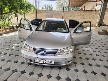 Nissan Sunny: 1.3 л | 2006 г. Седан — 3