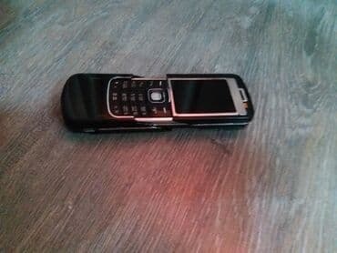 Apple iPhone: Qara rəngli sürüşdürülən düyməli mobil telefon Xüsusiyyətlər: - — 3