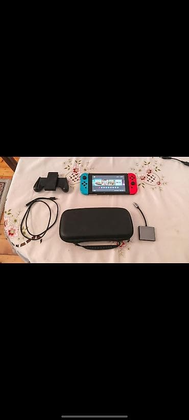 nintendo switch cip: Nintendo Switch konsolu yaxsi veziyyetdedi dock var hdmi ile — 2