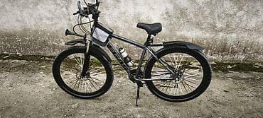 Dağ/şosse üçün universal velosiped – 29" təkərlər, qalın protektorlu