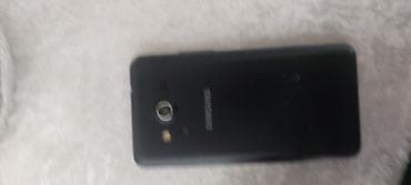 kotan 4 korpus: Samsung Galaxy Core 2, 4 GB, rəng - Ağ, Düyməli, Sensor, İki sim kartlı — 1