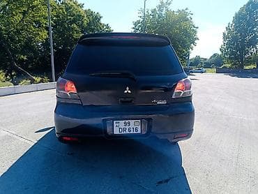 man sat: Mitsubishi Airtrek: 2 l | 2002 il 258000 km Van/Minivan — 7