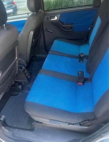 fort az: Opel Meriva, gümüşü rəng, kompakt miniven. Texniki və komplektasiya — 7