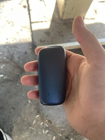 cubuqlar: Ploom elektron tütün cihazı - Brend: Ploom (korpusda loqo görünür) - — 1