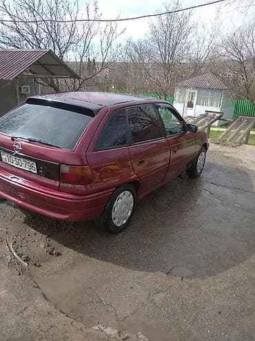 prius satışı: Opel Astra F hatchback, 5 qapı, tünd qırmızı rəng - Şüşələr: yan və — 1