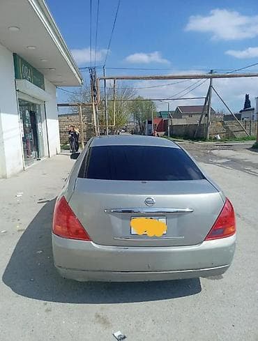 265 75 16: Nissan Teana: 2.3 l | 2003 il Sedan — 3