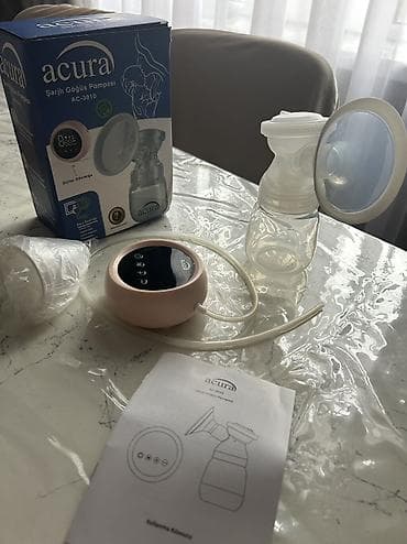Süt sağan aparat. Yenidir. Demək olarki istifadə edilməyib.masaj