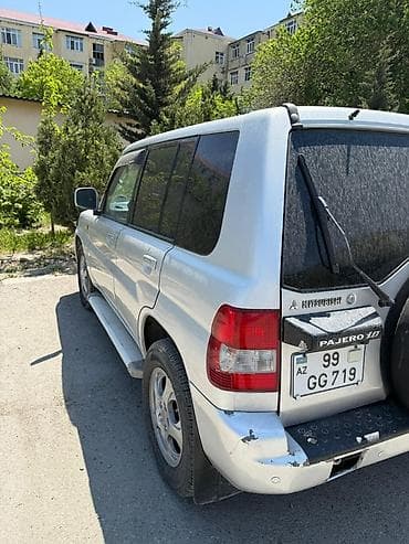 bmw x5 disk: Mitsubishi Pajero IO, gümüşü rəngdə, 5 qapılı kompakt SUV. Texniki və — 4