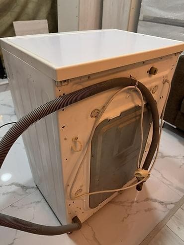 LG paltaryuyan və qurutma funksiyalı maşın LG Direct Drive daha az — 2