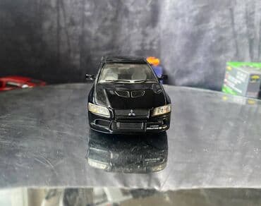 maşın modeli: Коллекционная модель Mitsubishi Lancer Evolution VII black 2002 — 4