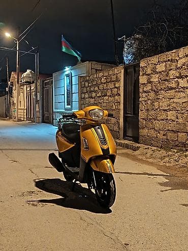 Şəhər içi sürüş üçün praktik və qənaətcil skuter. Texniki və dizayn