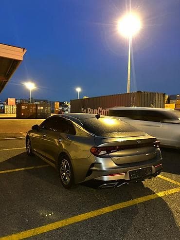 Nəqliyyat: Kia K5 – müasir sedan Xarici: - Gümüş rəngli kuzov, idman üslubunda — 4