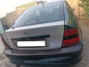 suru: Opel Vectra: 1.6 l | 1996 il Sedan — 2