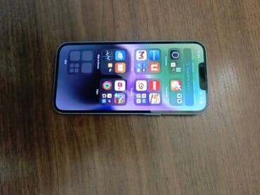 Kia: IPhone 14, 128 GB, Mavi, Simsiz şarj, Face ID, Sənədlərlə — 7