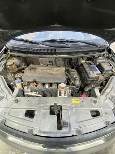 kia seed 2014: Boz rəngdə olan bu avtomobil rahat idarəetmə və funksionallıq təklif — 6