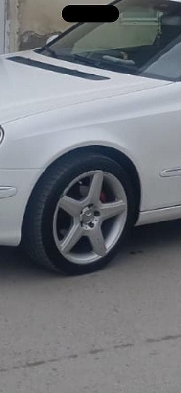 opel astra stop: Yüngül lehimli disk və təkər dəsti - 5 şüalı, gümüş rəngli yüngül — 1