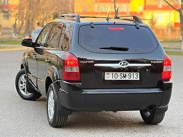 bmw e39: Hyundai Tucson: 2 l | 2007 il — 6