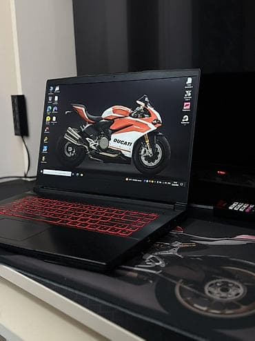 en ucuz mac: MSI oyun noutbuku - Model: MSI (qara korpus, qırmızı ejder loqosu və — 1