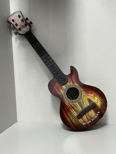simsek makvin: Uşaq üçün oyuncaq gitara - Model: “Guitar” yazılı başlıq, korpusda — 2
